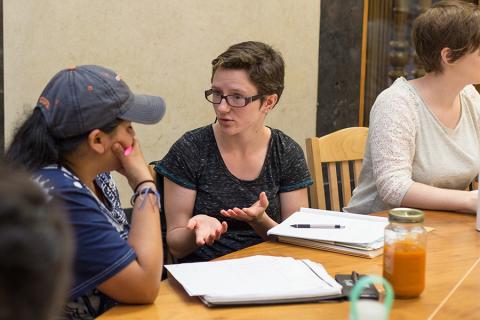Two students discussing in a classroom