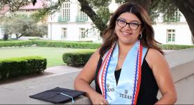 Nickoll Santos Garcia poses with her stole and other commencement attire.