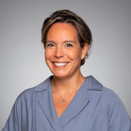 Picture of Jamie Fine on a gray background.