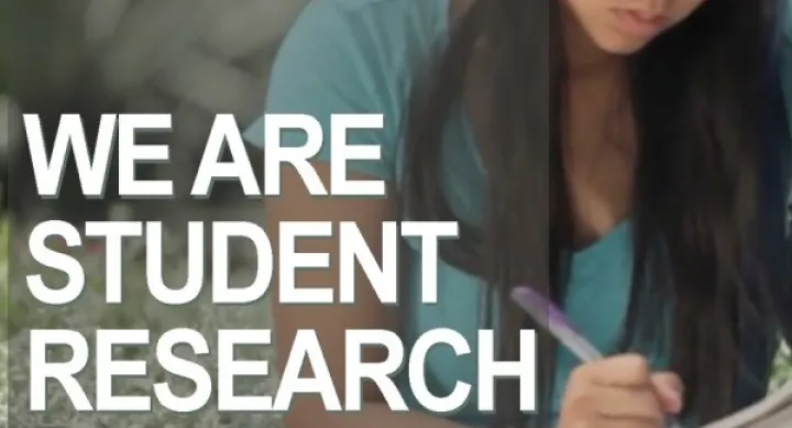 Woman writing in journal. Headline: We are Student Research