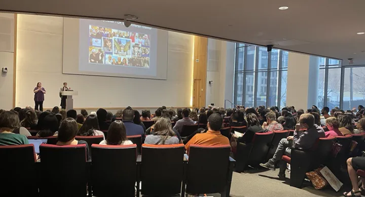 Professional development day event, auditorium filled with attendees